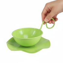 Artikel Decoratieve metalen kop met schotel, lichtgroen, H8cm Ø11,5cm, 2 stuks