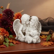 Artikel Engeldecoratie voor kinderen: Engelenpaar met hartsculptuur, 24 cm.