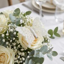 Artikel Vlinderdecoratie in wit op clip 7,5cmx7cm 4 stuks