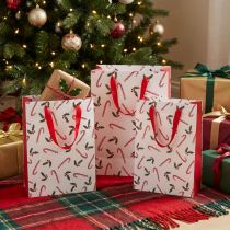 Artikel Kerstcadeauzakje met handvatten rood wit 24×18×8cm 4st