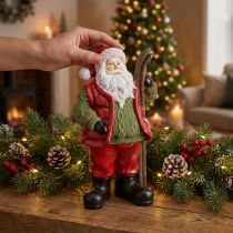 Artikel Decoratiefiguur van de Kerstman met ski, geschilderd 14×10,5×24,5 cm