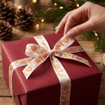 Artikel Cadeaulint met peperkoekfiguurtjes. Feestelijk lint voor kerstcadeaus. 25 mm x 18 m.