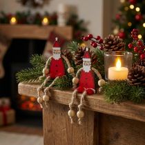Artikel Kerstmanfiguur zittend 6,5 cm rood 12st