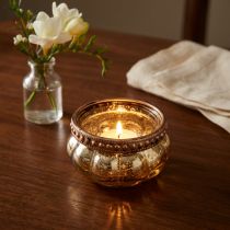 Artikel Theelichtje glas champagne antiek goud met metalen rand Ø6cm H3,5cm