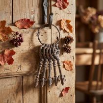 Artikel Vintage sleutelhanger in roestkleurig metaal, H20,5 cm