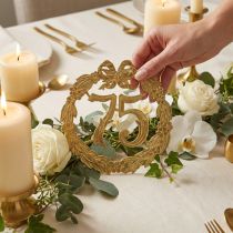 Artikel Jubileumnummer 75 in goud