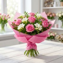 Artikel Boeipapier 25cm 100m stippen roze