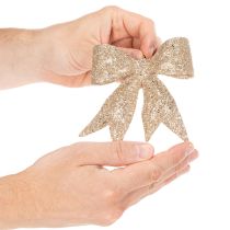 Artikel Glitterstrik, decoratieve strik, goudkleurig met clip, 11 cm, 4 stuks