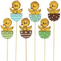 Artikel Paasdecoratie kuiken in ei houten decoratiefiguur op stok Pasen 7cm 12 st