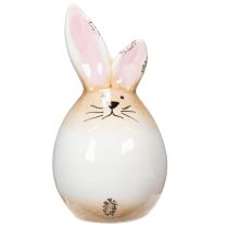 Artikel Paashaasje van keramiek, wit ei, decoratief beeldje van een konijn Ø6cm H11.5cm