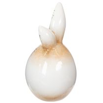 Artikel Paashaasje van keramiek, wit ei, decoratief beeldje van een konijn Ø6cm H11.5cm