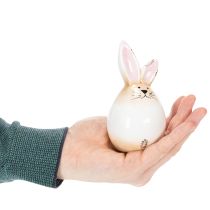 Artikel Paashaasje van keramiek, wit ei, decoratief beeldje van een konijn Ø6cm H11.5cm