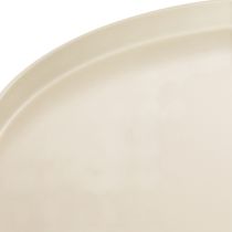 Artikel Decoratief rond beige bord met een voet van 40 cm hoog.