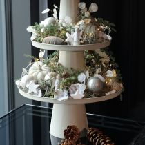 Artikel Decoratief rond beige bord met een voet van 40 cm hoog.