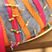 Artikel Cadeaulint gestippeld decoratief lint oranje 10mm 25m