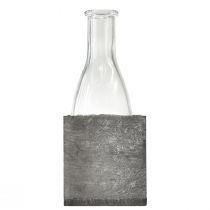 Artikel Glazen vaas op een grijze houten standaard van 20 cm. Rustieke decoratie met glazen fles.
