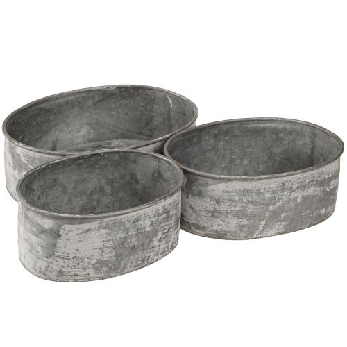 Artikel Decoratieve metalen schaal ovaal grijs L22,5/19,5/16cm set van 3
