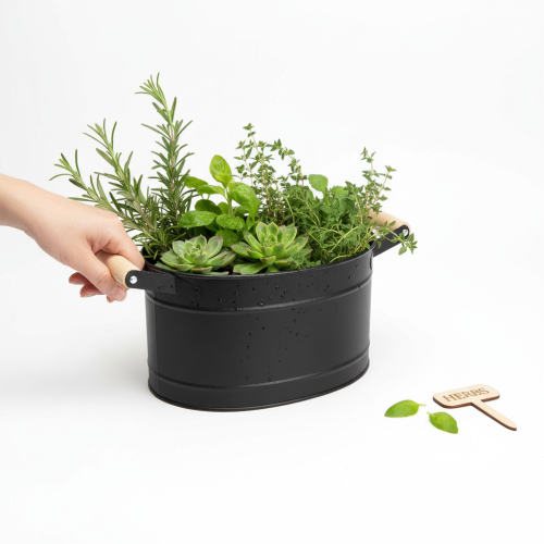 Artikel Ovale metalen bloempot met handvat, zwart met natuurlijke afwerking, 34x19,5x15 cm