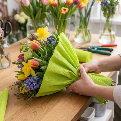 Bloemist crêpepapier mei groen