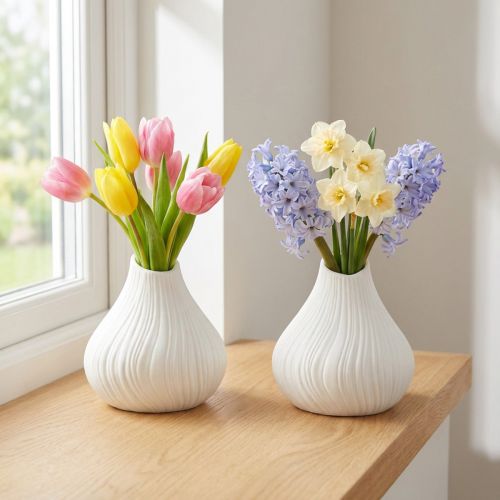 Artikel Bloemenvaas keramiek uivorm wit Ø13cm H13,5cm 2st