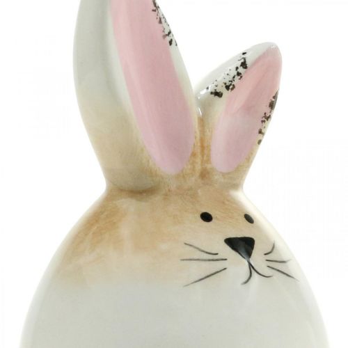 Artikel Paashaas keramiek wit ei decoratief figuur konijn Ø6cm H11.5cm