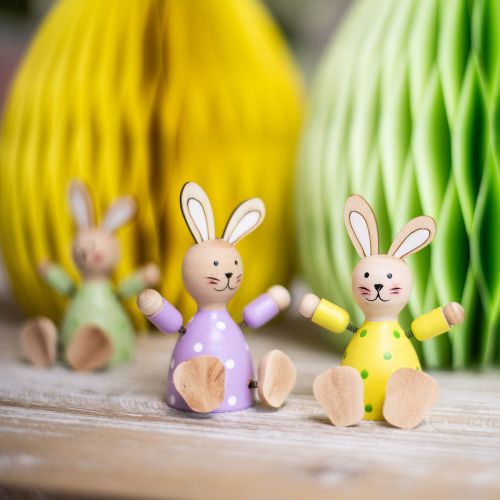 Artikel Paashazen kleurrijke houten konijnen gestippeld tafeldecoratie H8cm 4 st.