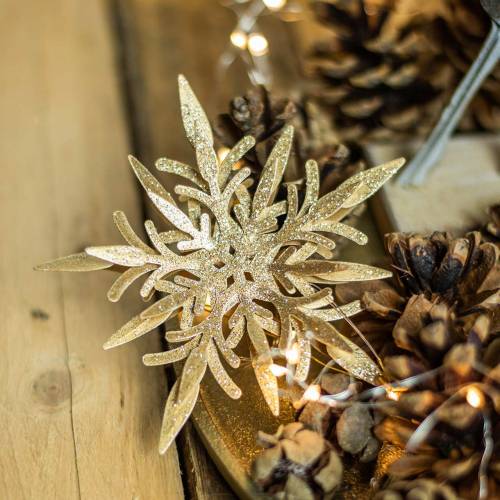 Artikel Sneeuwvlok 3D-effect goud 16cm x 15,5cm 2 st