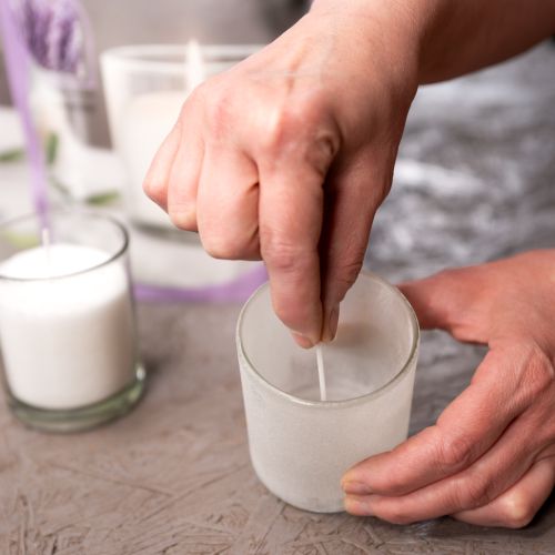 Artikel Kaarsenzandwaskorrels met lont geurende lavendel 400g