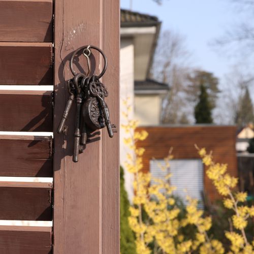 Artikel Metalen decoratieve sleutelbos met slot bruin H22cm