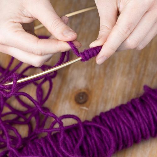 Artikel Paars wollen koord, 55 meter decoratief touw voor bloemschikken en knutselprojecten.